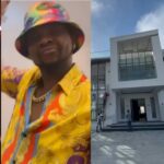 "I've always wanted a house on the water for my wife and kids," Kizz Daniel says as he purchases a new home