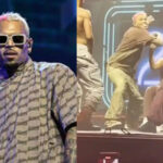 Moment Chris Brown throws a fan's phone into the crowd after she refused to acknowledge him while he danced on her lap. [Video]